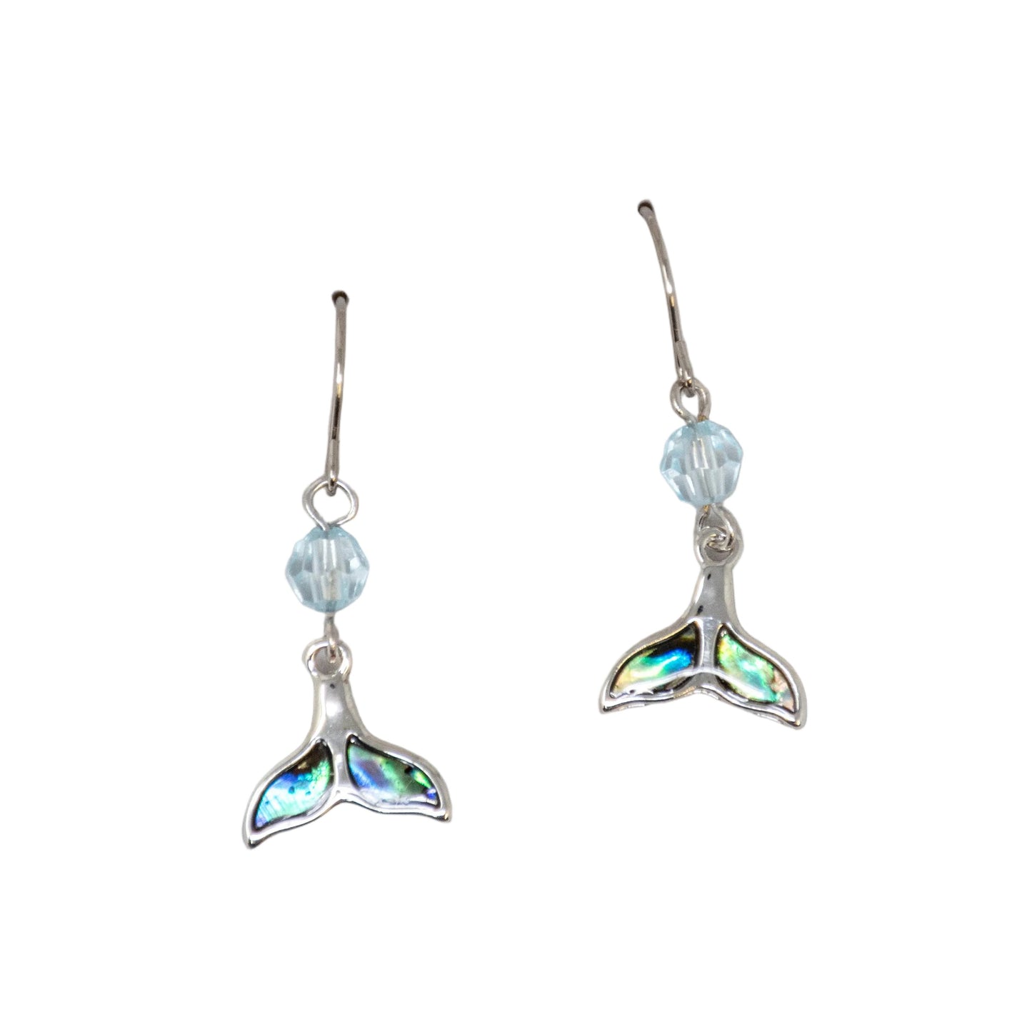Whale tail earrings with beaded accents on a white background
