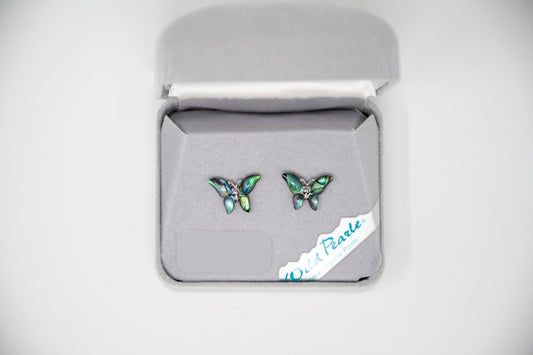 Butterfly-shaped earrings in a gray box on a white background