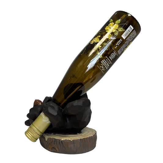 Wine bottle holder with a wine bottle on