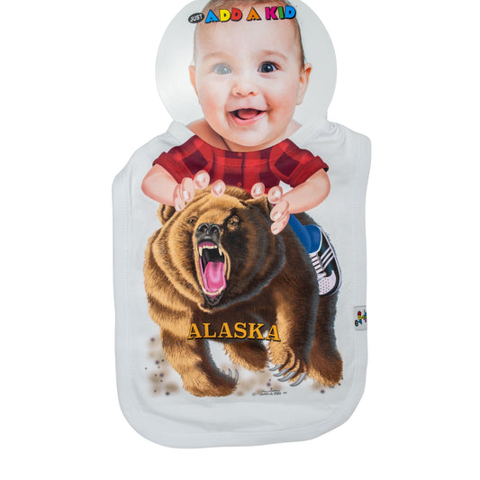 Baby bib with a bear and 'Alaska' design, featuring a child holding the bear.
