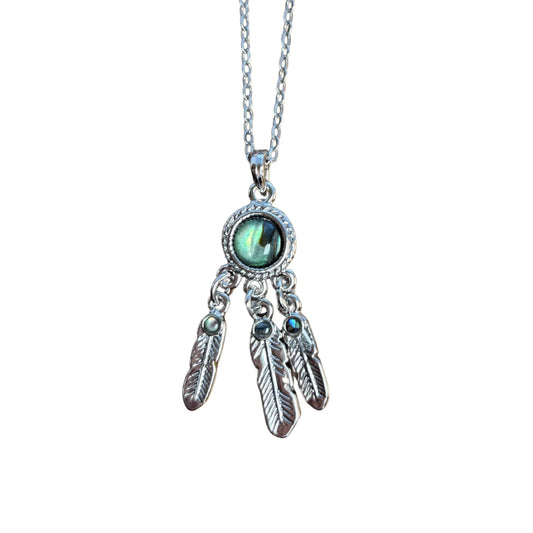Necklace with a pendant featuring a dream catcher