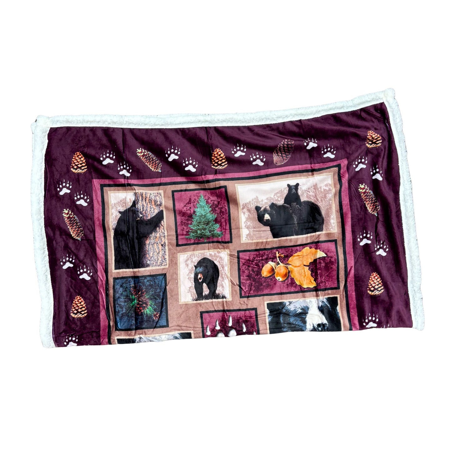 Blanket with bear and nature pattern on a white background