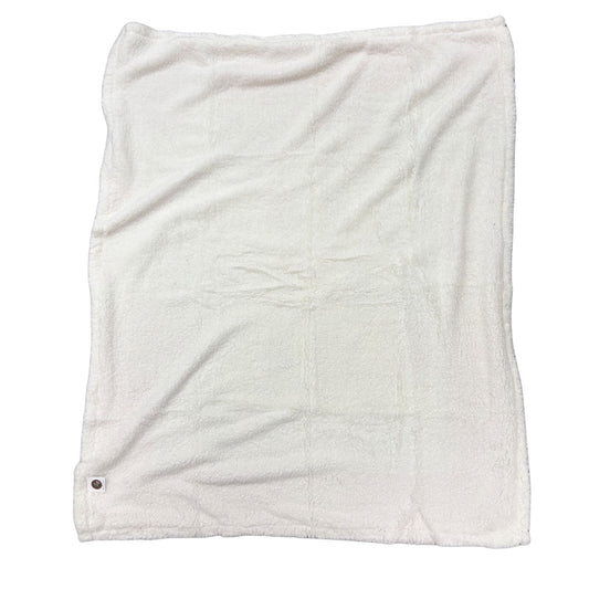 Back side of a throw blanket with soft white material