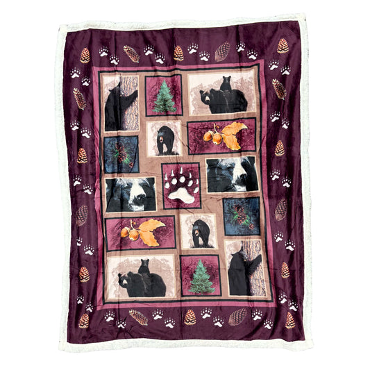 Throw blanket with bears and pine cone design