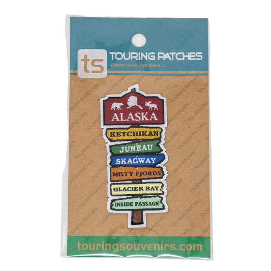 Packaging of a signpost shaped patch with Alaska destinations