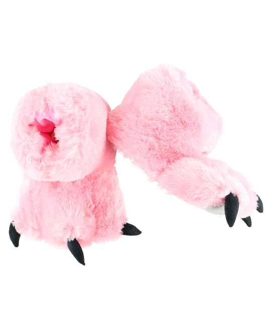 Pink plush paw slippers on a white background