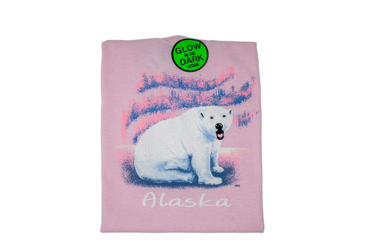 Folded pink youth shirt with a polar bear graphic and 'Alaska' text on a white background
