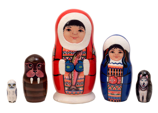 Set of colorful nesting dolls with traditional patterns on a white background