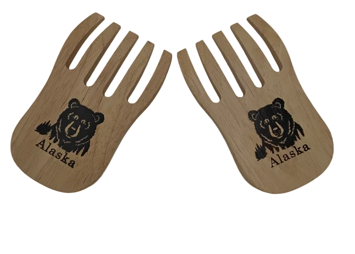Two wooden salad servers with bear and Alaska engraving