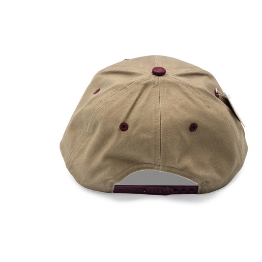 Back of beige cap with red accents on a white background