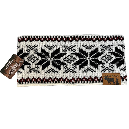 Knitted headband with a pattern and 'Alaska' label