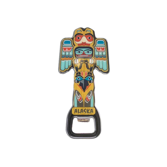 Colorful bottle opener with totem design on a white background