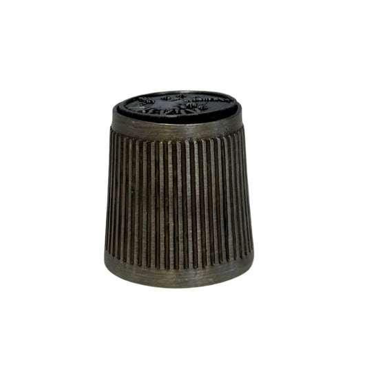 Metallic thimble with textured surface