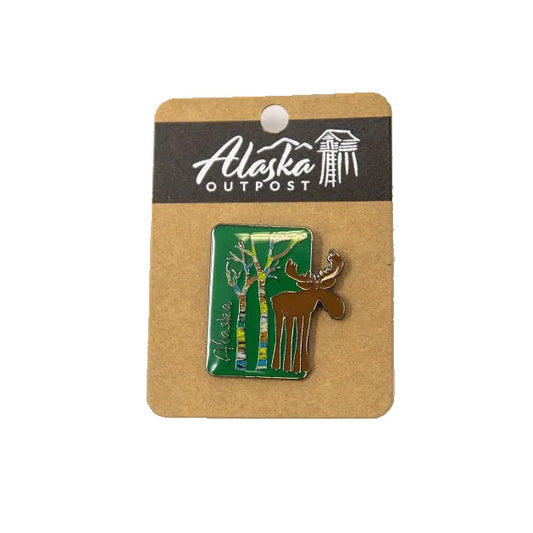 Pin with moose design on a card labeled 'Alaska Outpost'