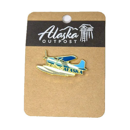 Seaplane pin on a card with 'Alaska Outpost' branding on a white background