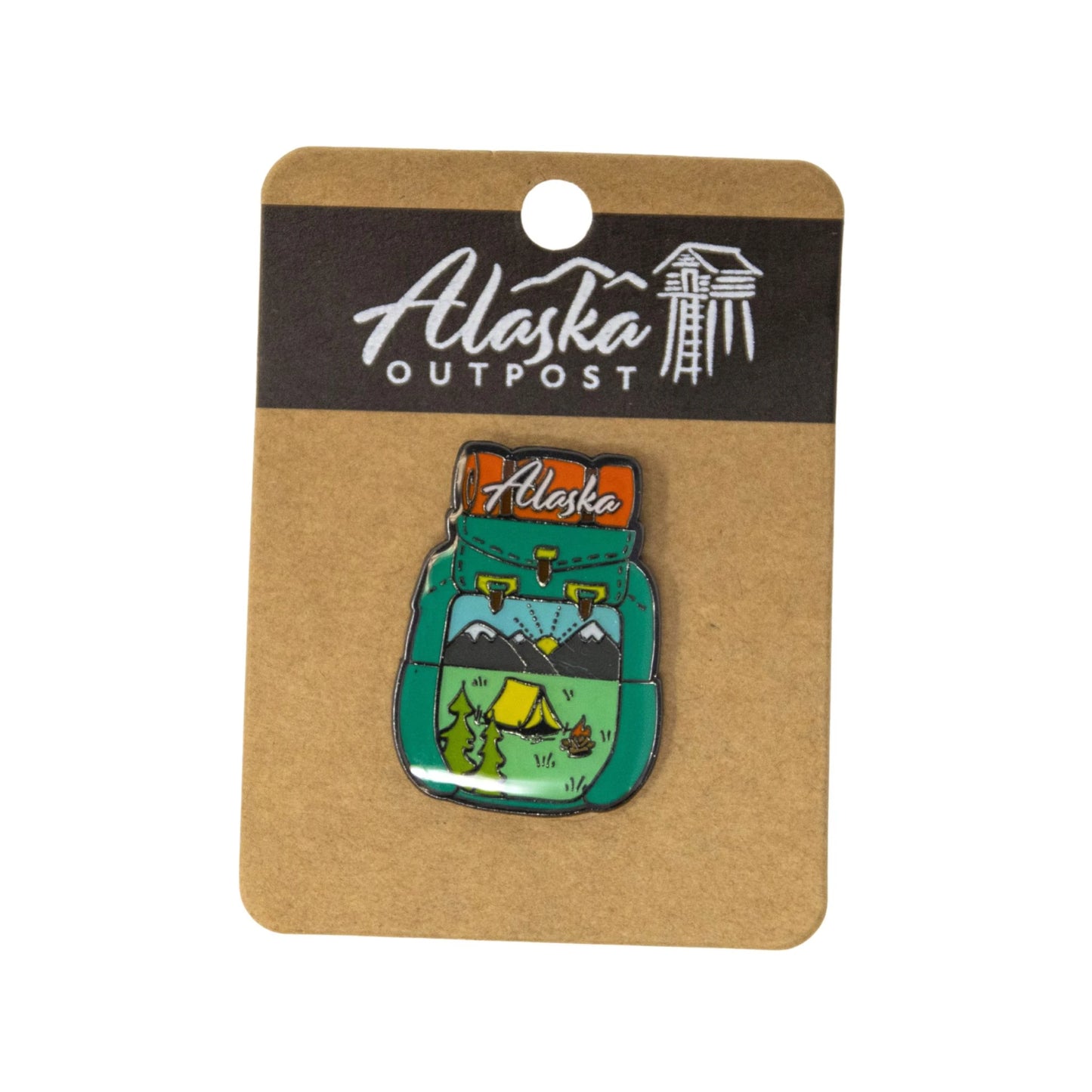 Alaska Backpack enamel pin on a cardboard backing