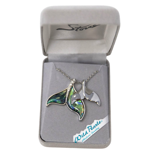 Jewelry box with a necklace featuring green and silver whale tails