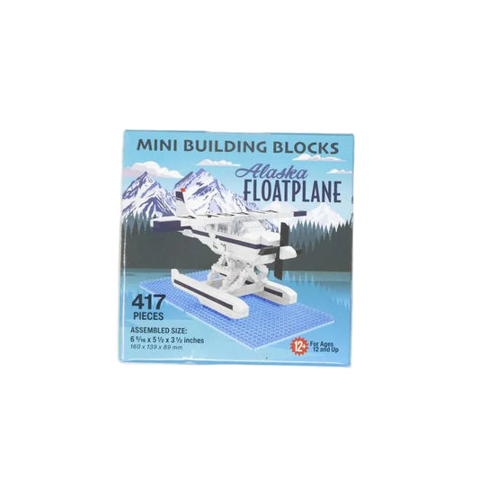 Box of mini building blocks with an Alaska floatplane design on a white background
