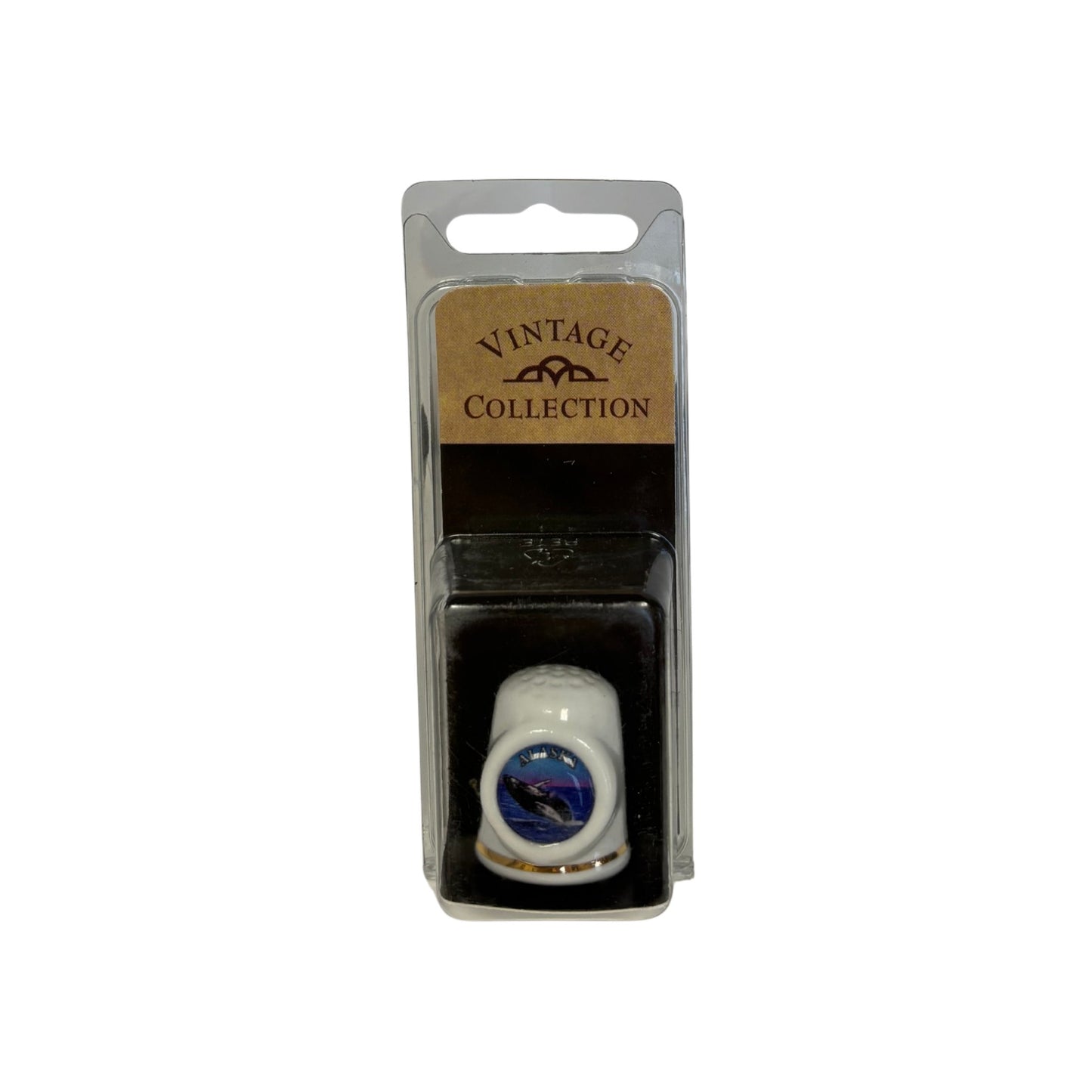 Vintage Collection packaging with a small thimble with a whale design