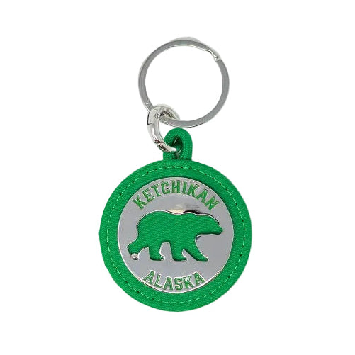 Green keychain with a bear design and 'Ketchikan Alaska' text on a white background