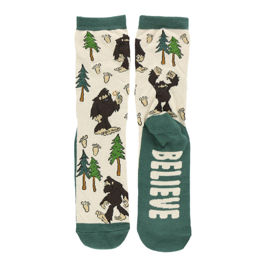 Socks with bigfoot and tree design on a white background