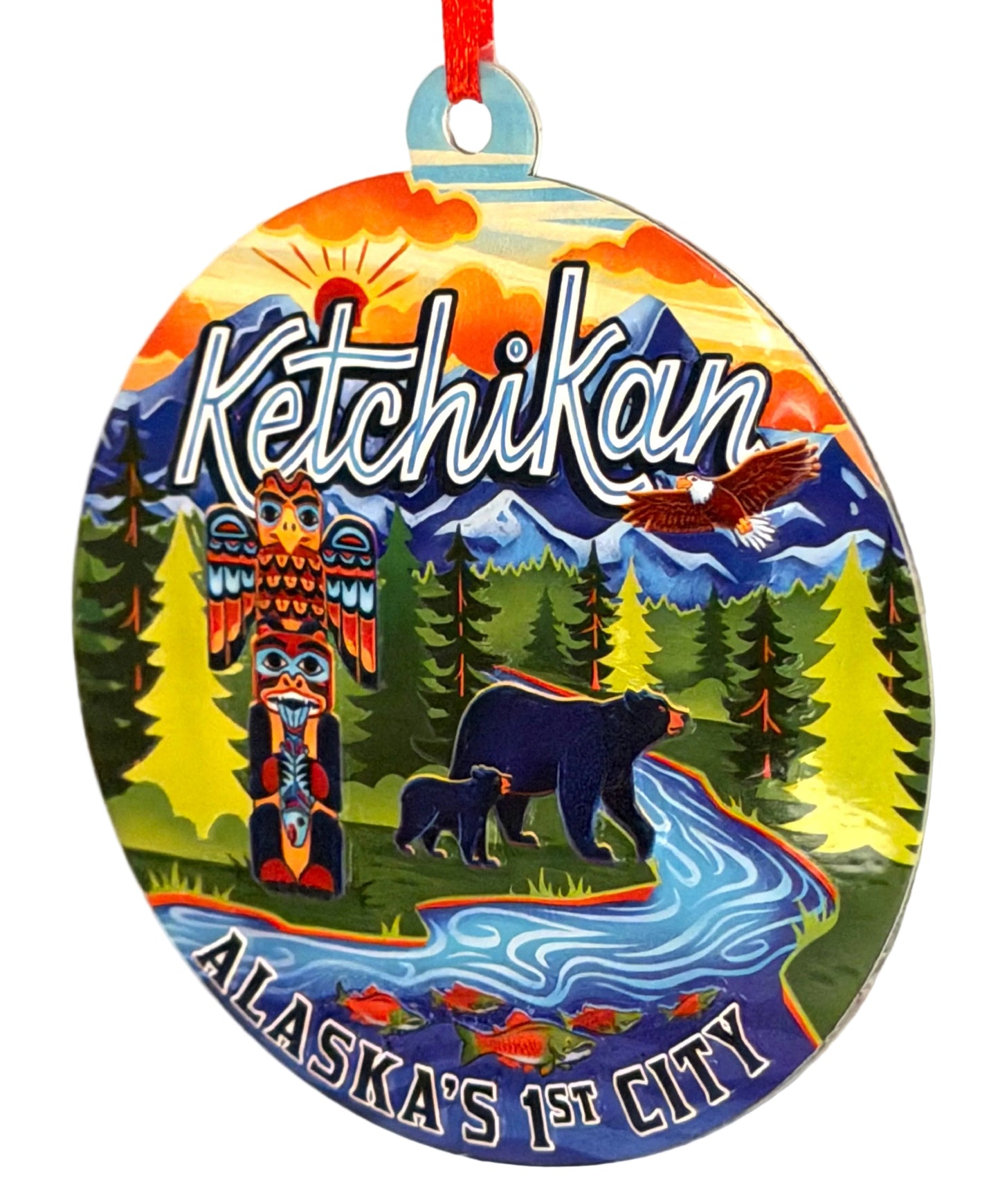 Decorative ornament with Ketchikan, Alaska's 1st City text, bears, totem pole, and nature scene.