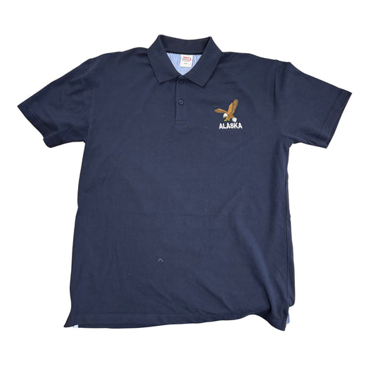 Navy blue polo shirt with 'Alaska' and eagle design on a white background