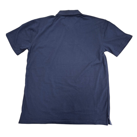Navy blue polo shirt on a white background