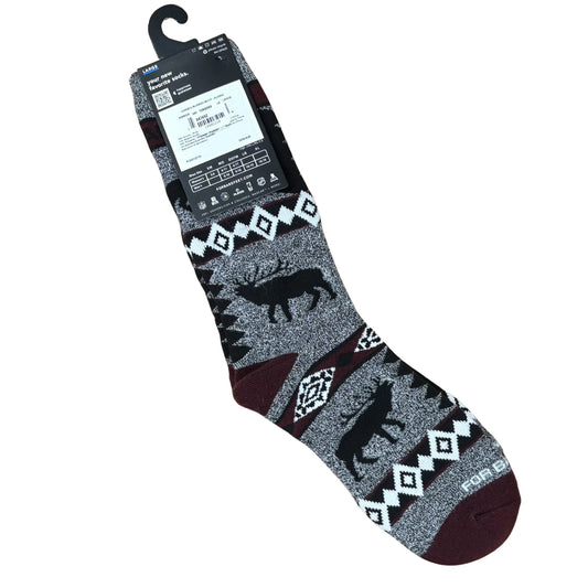 Gray sock with black and white pattern on a white background