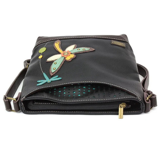 Black leather handbag with dragonfly design on a white background