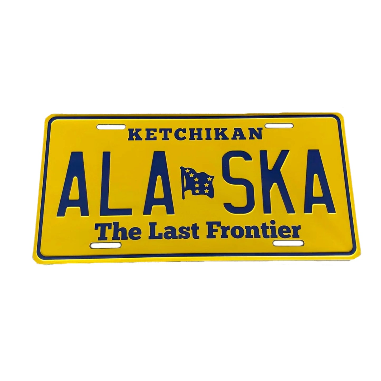 Yellow Alaska license plate with blue text and a flag symbol