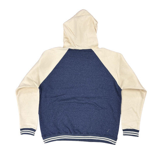 Hoodie with blue back and cream sleeves on a white background
