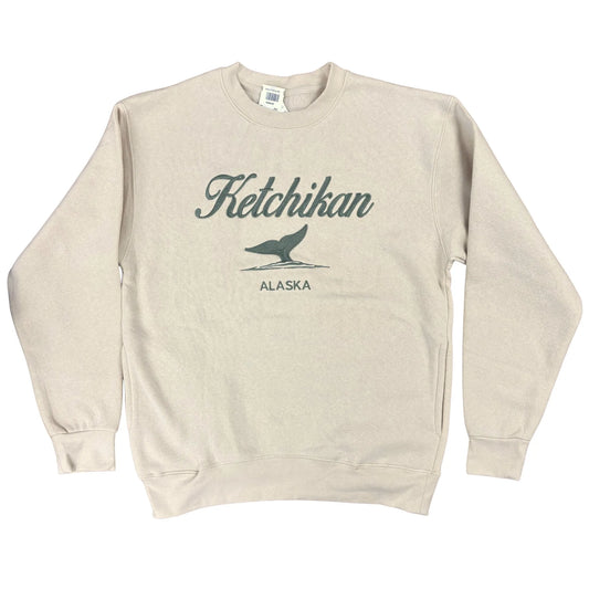 Beige sweatshirt with 'Ketchikan Alaska' text and whale graphic with pockets