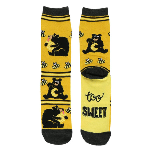 Yellow socks with black bear and honey design on a white background