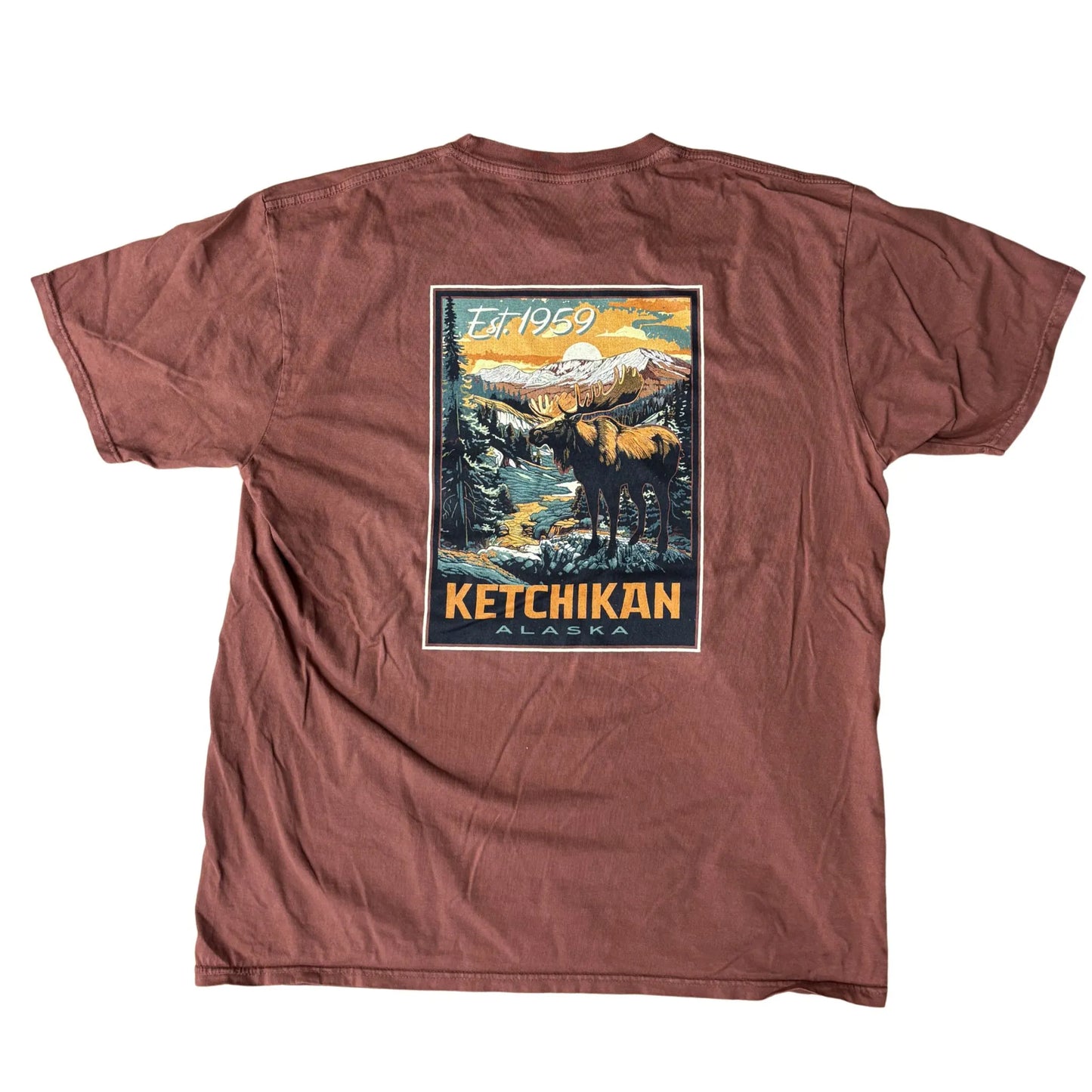 Red t-shirt with a graphic design on the back featuring mountains and a moose, labeled 'Ketchikan, Alaska'.