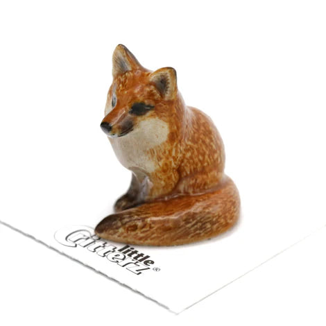Small fox figurine on a white background with 'Little Fox' branding.