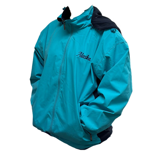 Turquoise jacket with 'Alaska' branding on a white background