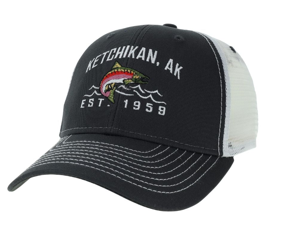 Black and white cap with Ketchikan, AK text and fish design on a white background