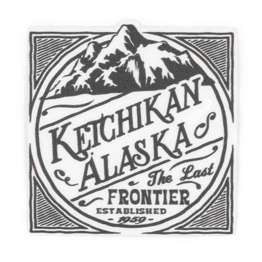 Black text of Ketchikan, Alaska with mountain illustrations sticker