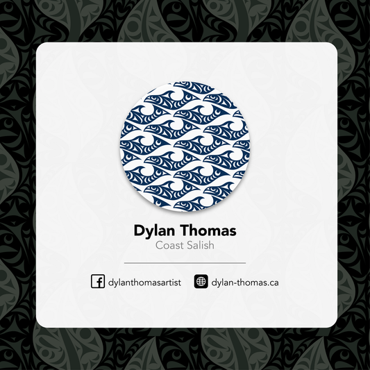 Business card with a blue and white pattern, name 'Dylan Thomas', and contact information