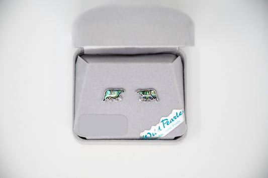 Pair of bear-shaped earrings in a jewelry box on a white background