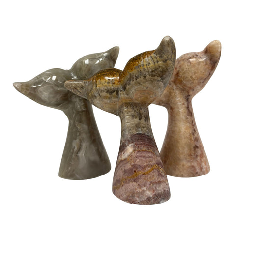 3 whale tail marble statues