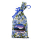 Bag of Ketchikan Wild Blueberry Pancake Mix with blue ribbon on a white background