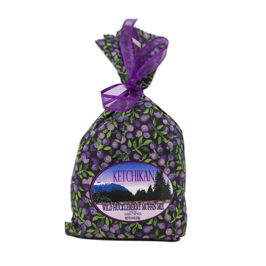 Packaged product with purple ribbon and Ketchikan branding on a white background