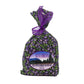 Packaged product with purple ribbon and Ketchikan branding on a white background