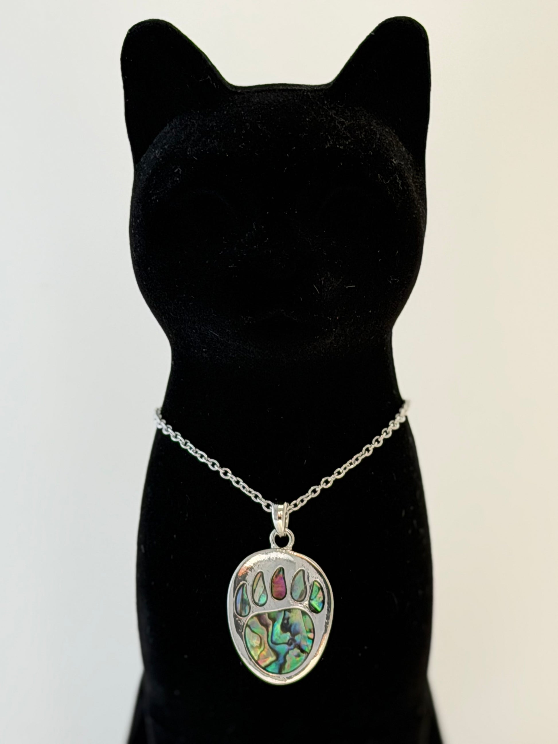 Necklace with a multicolored bear paw pendant 
