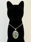 Necklace with a multicolored bear paw pendant 