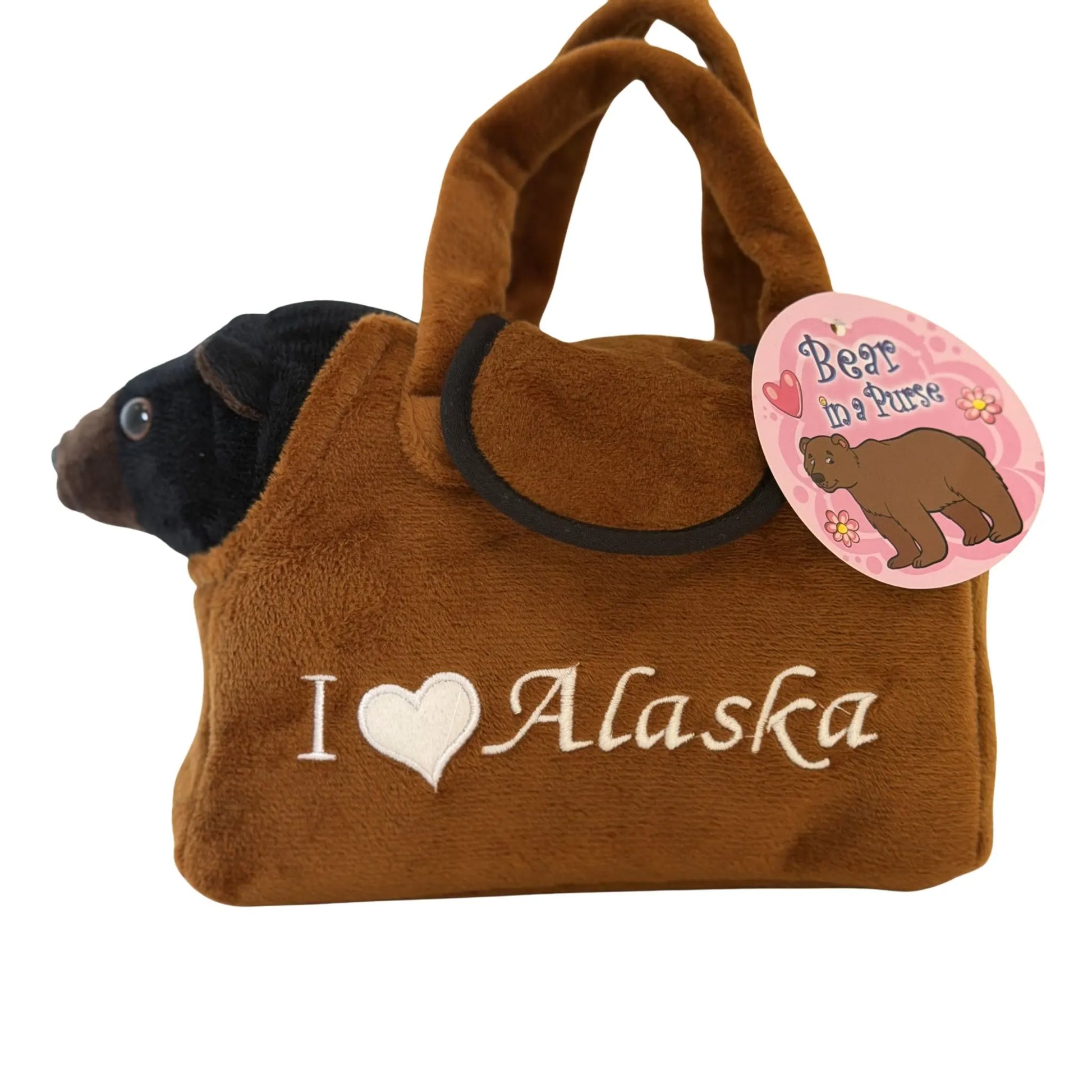 Brown plush handbag with a bear toy inside, featuring 'I ❤️ Alaska' text