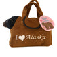 Brown plush handbag with a bear toy inside, featuring 'I ❤️ Alaska' text
