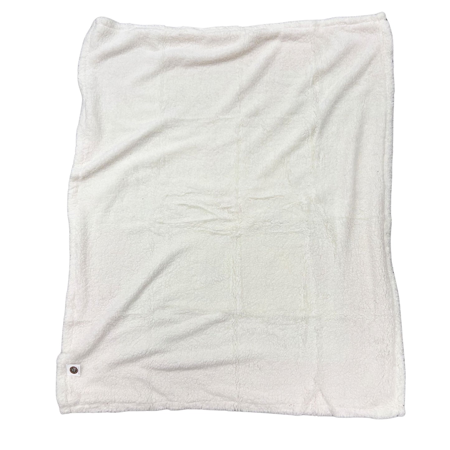 Back side of a throw blanket with soft white material